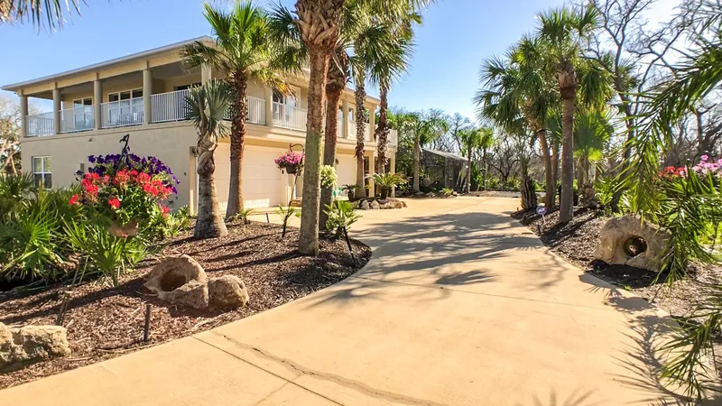 “Oasis by the Sea” Beach Front Community – Luxurious Pool Spa Home with Waterfall Free golf cart